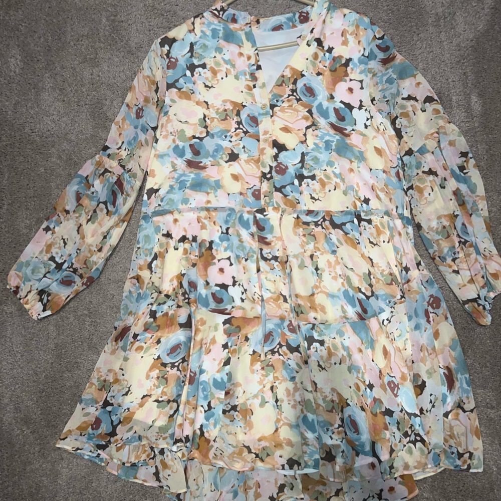Long sleeve flowery dress.